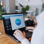 How to use free resources for branding - designer working on laptop