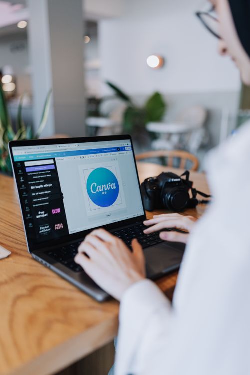 How to use free resources for branding - designer working on laptop