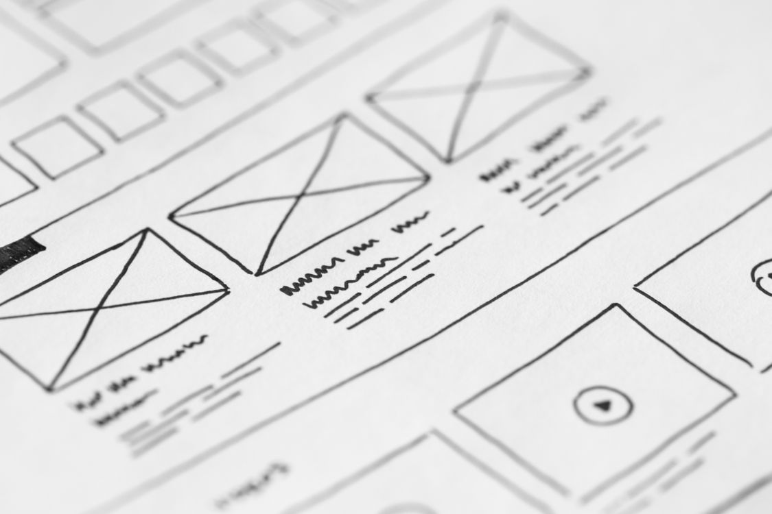 Small business owner creating social media graphics using Canva free design tool